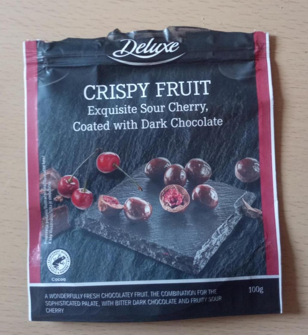 Képek - Crispy fruit exquisite sour cherry, coated with dark chocolate Deluxe