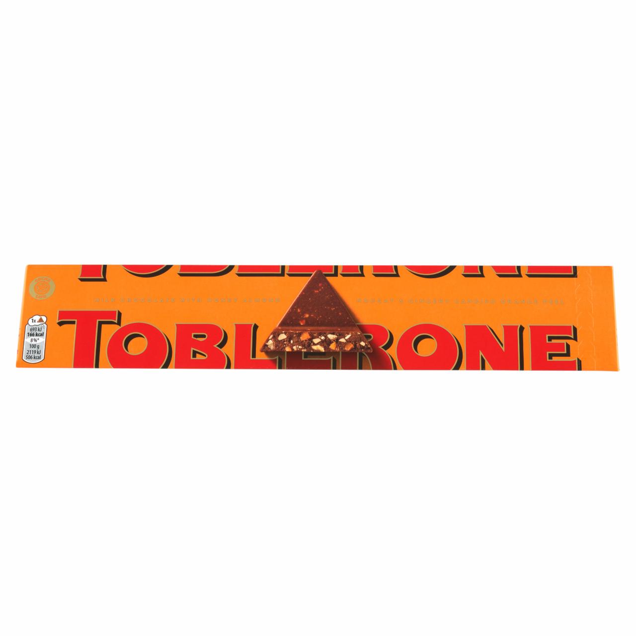 Képek - Toblerone tejcsokoládé kandírozott narancshéjjal, gyömbérrel, mézzel és mandula nugáttal 360 g