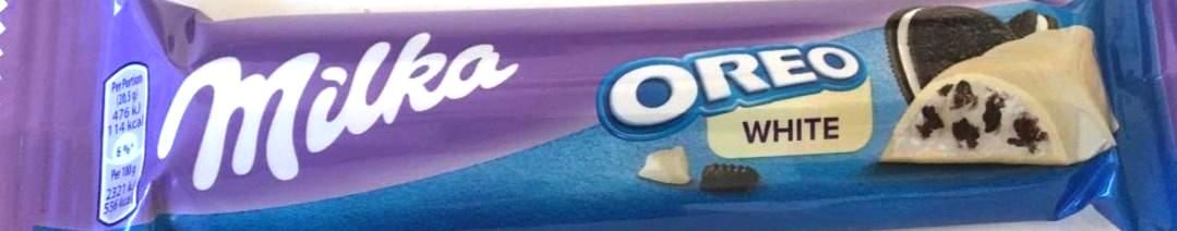 Képek - Milka Oreo White fehér csokoládé kakaós kekszdarabokkal és vaníliaízű tejes krémtöltelékkel