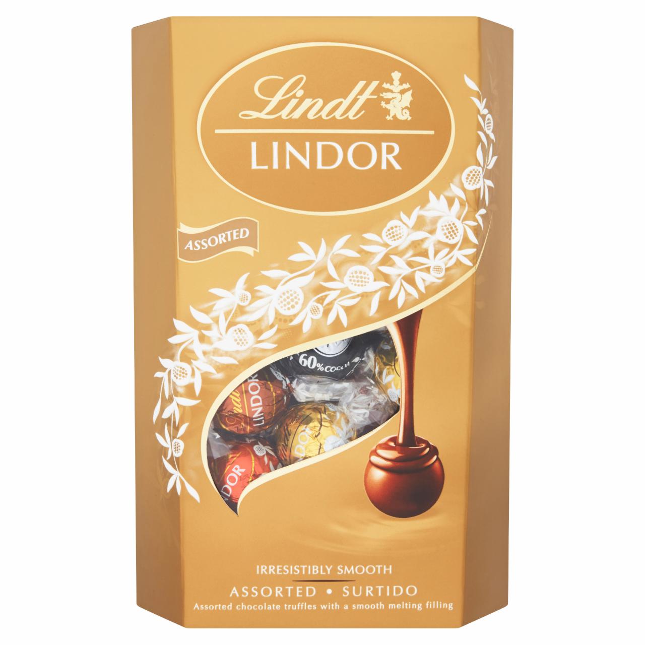 Képek - Lindt Lindor tejcsokoládé-tejcsokoládé mogyoródarabokkal-fehér- és keserű csokoládé praliné 337 g