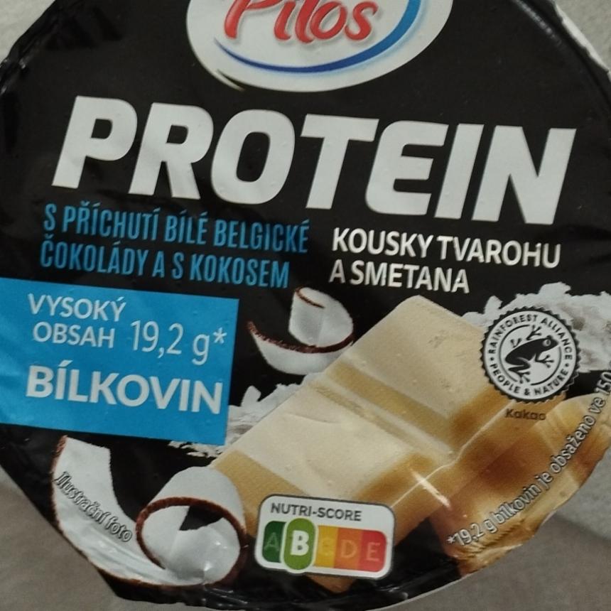 Képek - Protein kousky tvarohu a smetana s příchutí bílé belgické čokolády a s kokosem Pilos