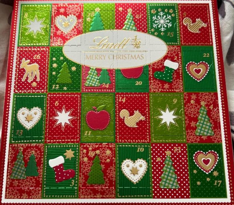 Képek - Lindt Merry Christmas Adventi naptár tejcsokoládé és fehér csokoládé vegyes töltelékkel 115 g
