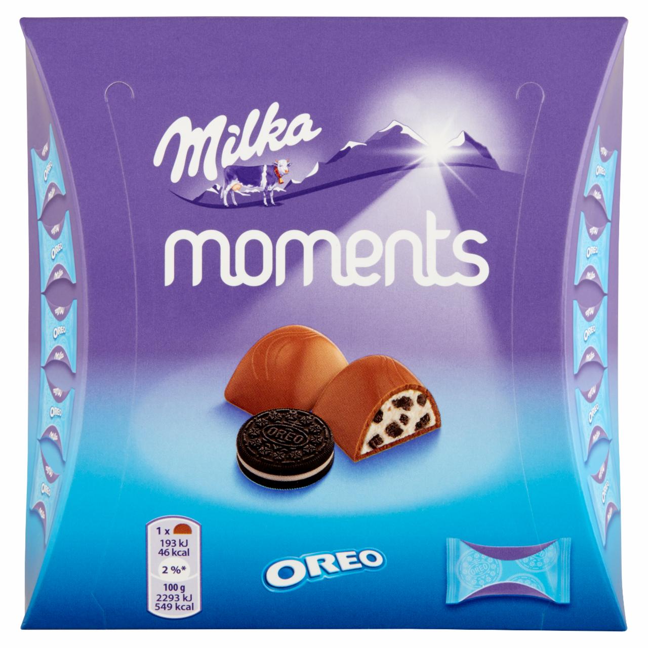 Képek - Milka Moments Oreo alpesi tejcsokoládé tejes krémtöltelékkel és kakaós kekszdarabokkal 11 db 92 g
